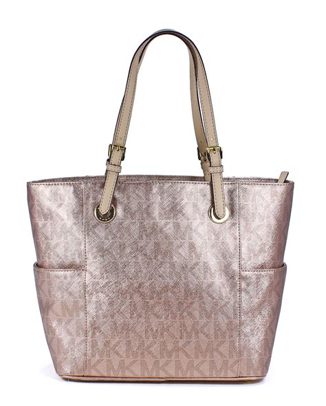 michael kors rose gold handbag floral pattern|Michael Kors gold evening bag.